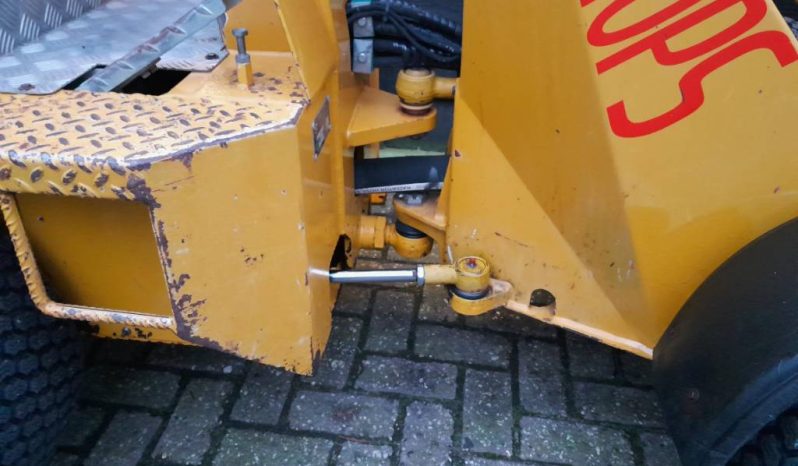 Knikmops 90 minishovel puinbak palletvorken en tegelriek vol