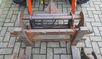 Kubota R 420 midi shovel met bak en vorken vol