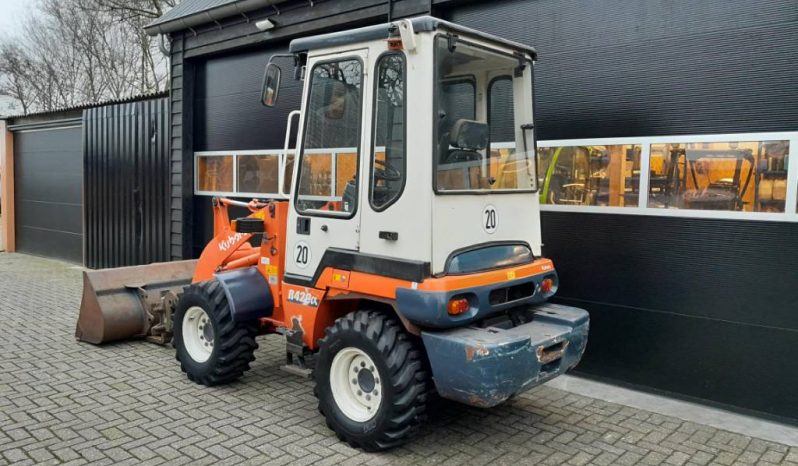 Kubota R 420 midi shovel met bak en vorken vol