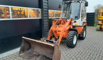 Kubota R 420 midi shovel met bak en vorken vol