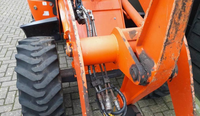 Kubota R 420 midi shovel met bak en vorken vol