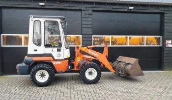 Kubota R 420 midi shovel met bak en vorken vol