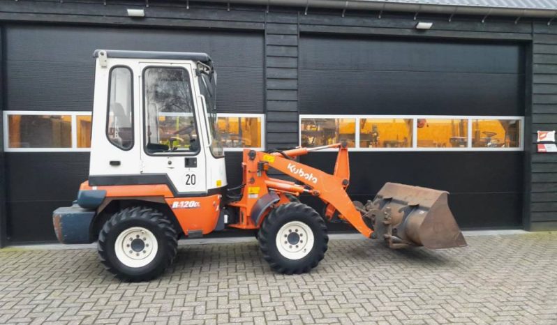 Kubota R 420 midi shovel met bak en vorken vol